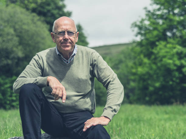 istock Senior man resting in nature 810798120