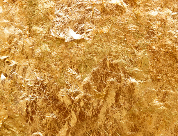 istock Shiny yellow leaf gold foil texture 810811544