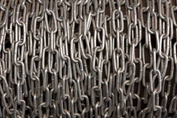 istock Chain heap metal background texture photo 810825194