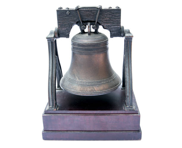istock Old souvenir bell isolated on white background 810857008