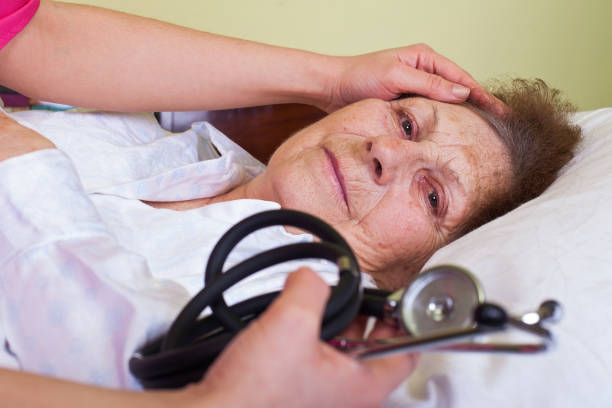 istock Elderly woman in bed 810857220
