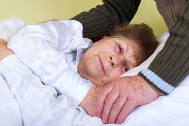 istock Bedriedden elderly woman 810857274
