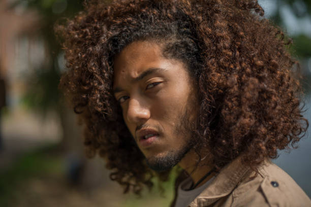 istock Handsome man with afro haircut 810857476