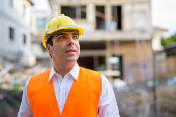 istock Portrait of handsome Persian man construction worker on the construction site 810868934