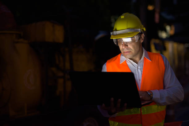 istock Portrait of handsome Persian man construction worker on the construction site at night 810869564