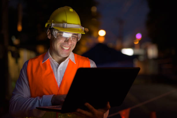 istock Portrait of handsome Persian man construction worker on the construction site at night 810869638