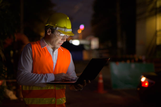 istock Portrait of handsome Persian man construction worker on the construction site at night 810869756