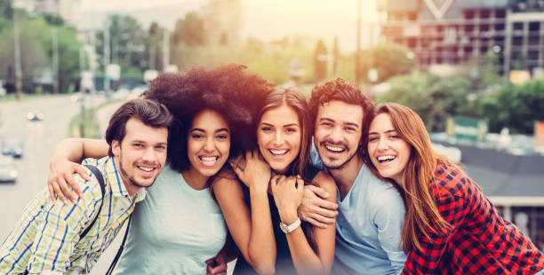 istock Group of friends smiling to the camera 810874568