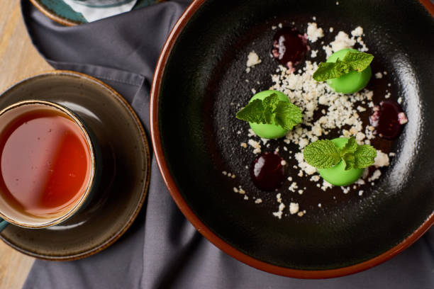 istock Small green glazed apples desert 810876664