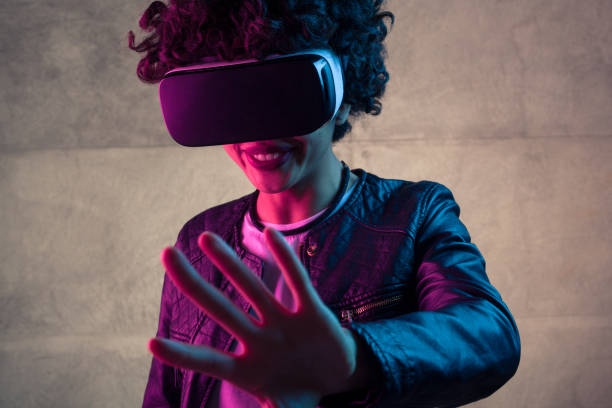 istock Woman touching air in VR headset 810877288