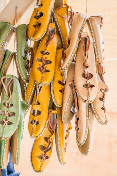 istock Set of traditional hand made leather shoes in bazaar 810877310