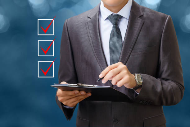Businessman and buttons checklist on a blue background.