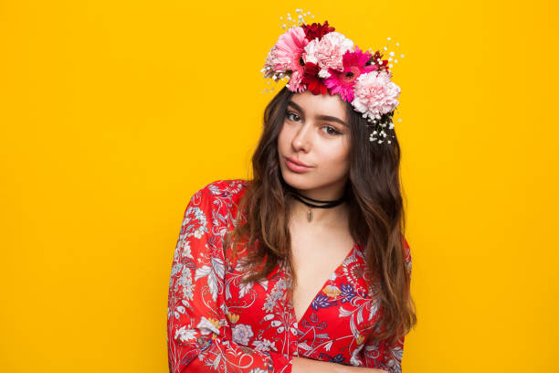 istock Brunette girl wearing flower crown 810877646