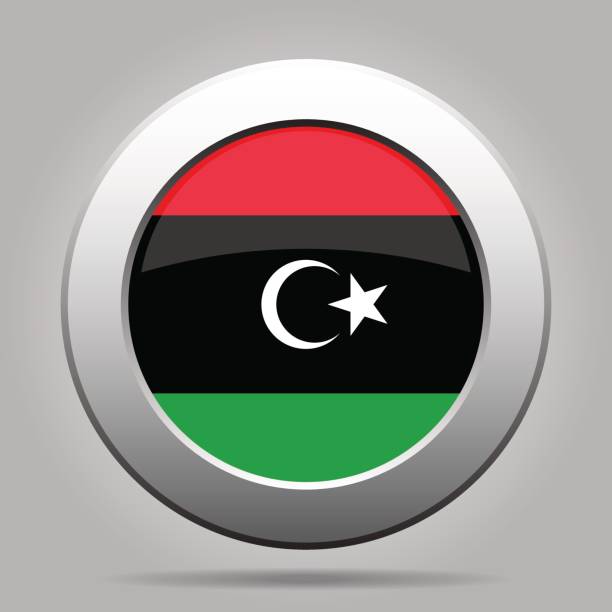 flaga libii. błyszczący metalowy szary okrągły przycisk. - libya flag libyan flag three dimensional shape stock illustrations