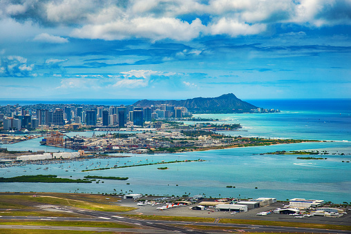 The beautiful skyline of Honolulu Hawaii shot from an altitude of about 200 feet from a distance during a helicopter photo flight of the island.