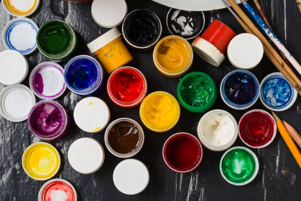 istock Different  colors in the banks, pencils and brushes 810909352