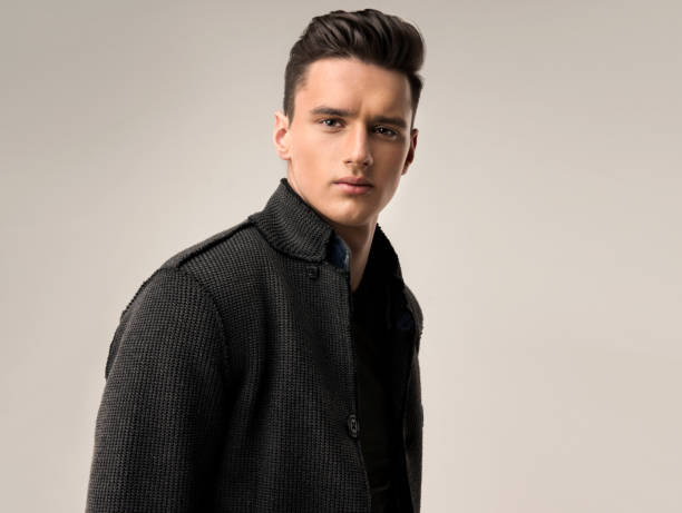 Handsome yong man dressed in a stylish wool jacket.
