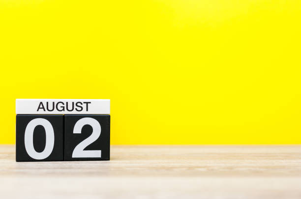 istock August 2nd. Image of august 2, calendar on yellow background. Summer time. With empty space for text 810930926