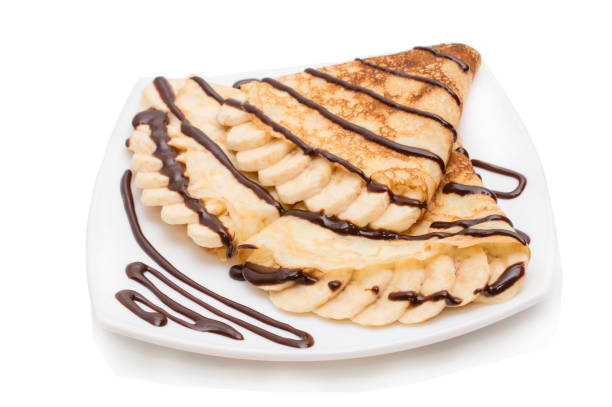 istock Crepes with bananas and cream 810933820