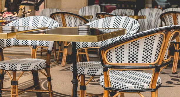 istock Parisian terrace with tables, chairs and ashtrays 810934110