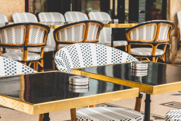 istock Parisian terrace with tables, chairs and ashtrays 810934200