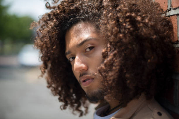 istock Handsome man with afro haircut 810939814