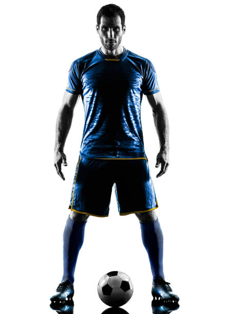 istock soccer player man standing silhouette isolated 810943450