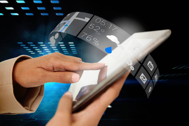 istock Businesswoman touching tablet with app interface 810974666