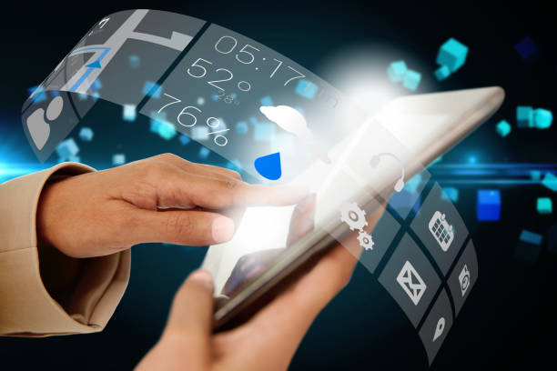istock Businesswoman touching tablet with app interface 810974800
