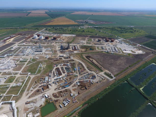 istock Refinery. Ready-to-use areas with equipment and equipment under construction. Site for a warehouse of building materials and metal. 810992572