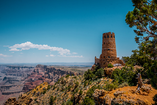 ancient picturesque stone tower on the edge of a cliff in the Grand Canyon. Survey area. Deserted Viev. Arizona Tourist Attractions