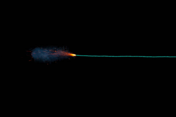 istock Long green fuse burning on black background isolated 811016680