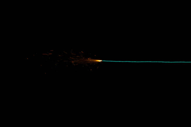 istock Long green fuse burning on black background isolated 811016684