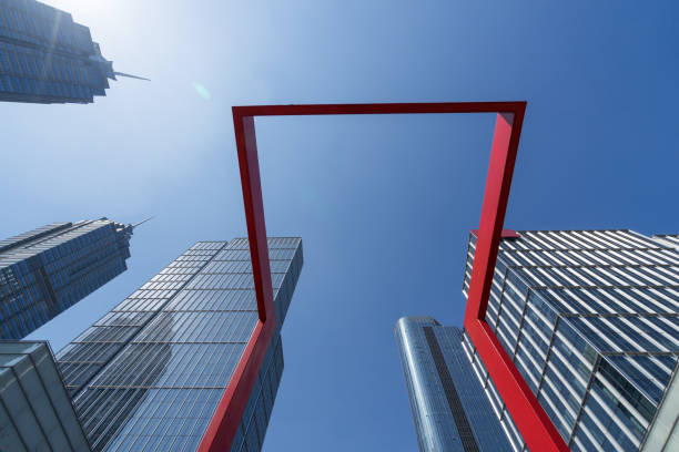 istock Low angle view of modern metallic skyscrapers 811036598