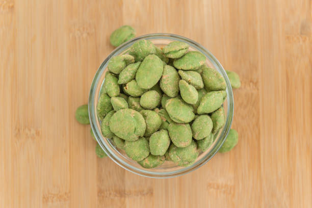 istock Peanuts (with Wasabi flavor) on vintage wooden background 811041510