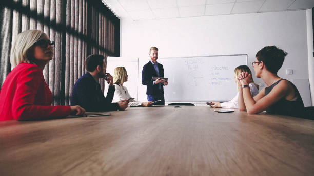 istock Business man presenting new ideas and projects to his team 811056066