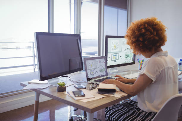 istock Focused businesswoman working in office 811056386