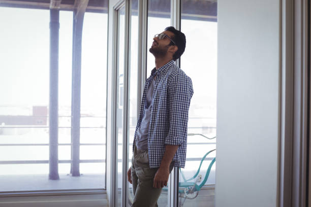 istock Unhappy businessman in office 811065484