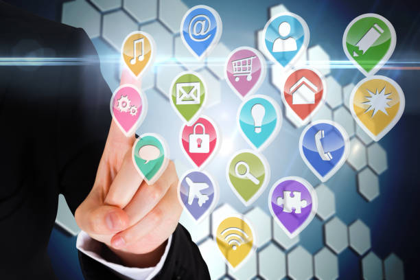 istock Finger pointing to app icons 811074228