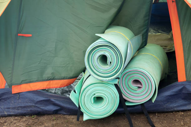 istock Camping tent with fog and trees 811093998