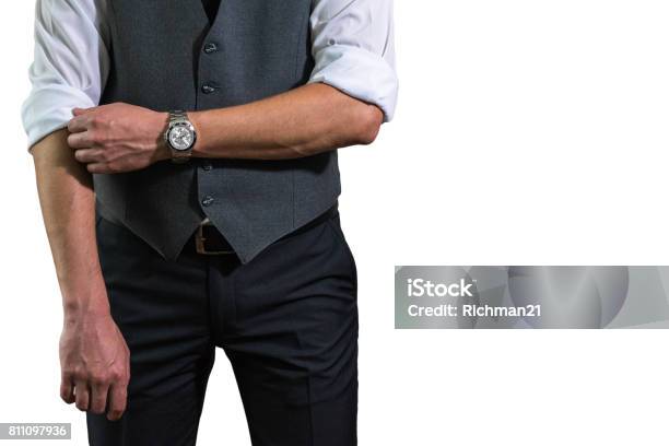 A Young Businessman In A White Shirt Rolls Up His Sleeves Prepar Stock Photo - Download Image Now