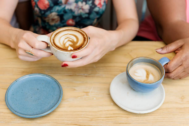 istock Young Women Drinking Coffee Concept 811113988