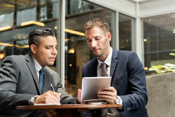istock Business Men Meeting Tablet Concept 811116816