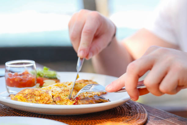 istock Mid adult men eating scrambled eggs and baked beans 811143906