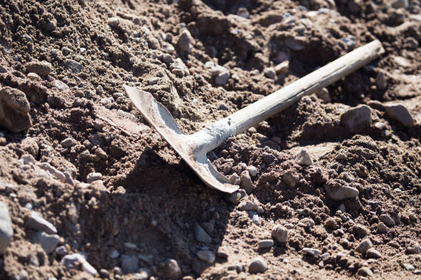 istock Shovel on a mixture of concrete at the construction site 811159824