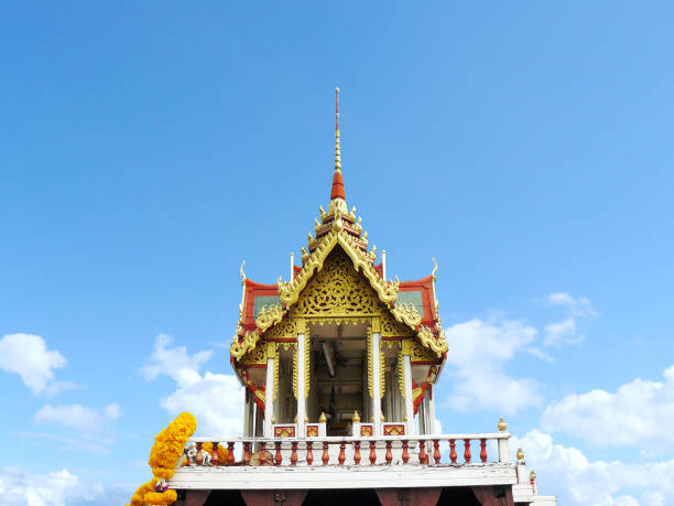 Thailand Spirit House on the sky background. A spirit house is a shrine to the protective spirit of a place.Traditional culture of religion believe in many country in Southeast Asia.