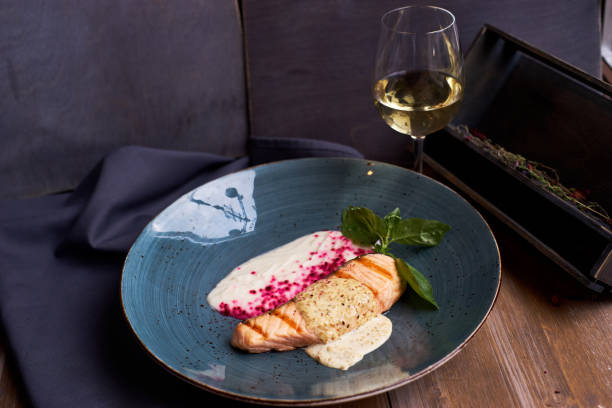 istock Grilled salmon steak on blue plate 811168570