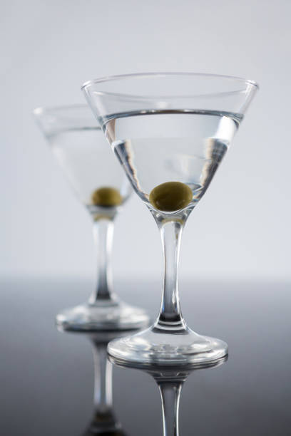 istock Cocktail martini with olives on table 811168746