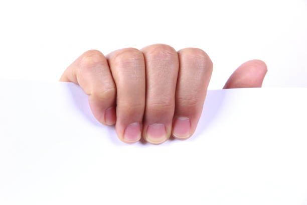 istock Male hand holding a blank white paper 811171552