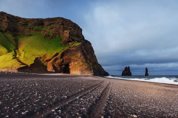 istock Famous Reynisdrangar rock formations at black Reynisfjara Beach 811180076